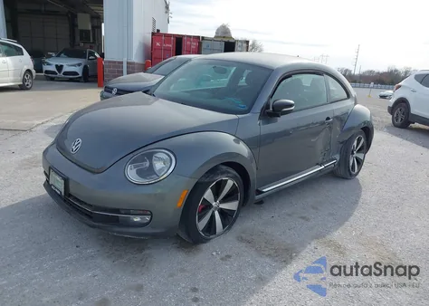2012 Volkswagen Beetle 2.0T Turbo z USA, uszkodzony, nr VIN 3VW467AT7CM623809